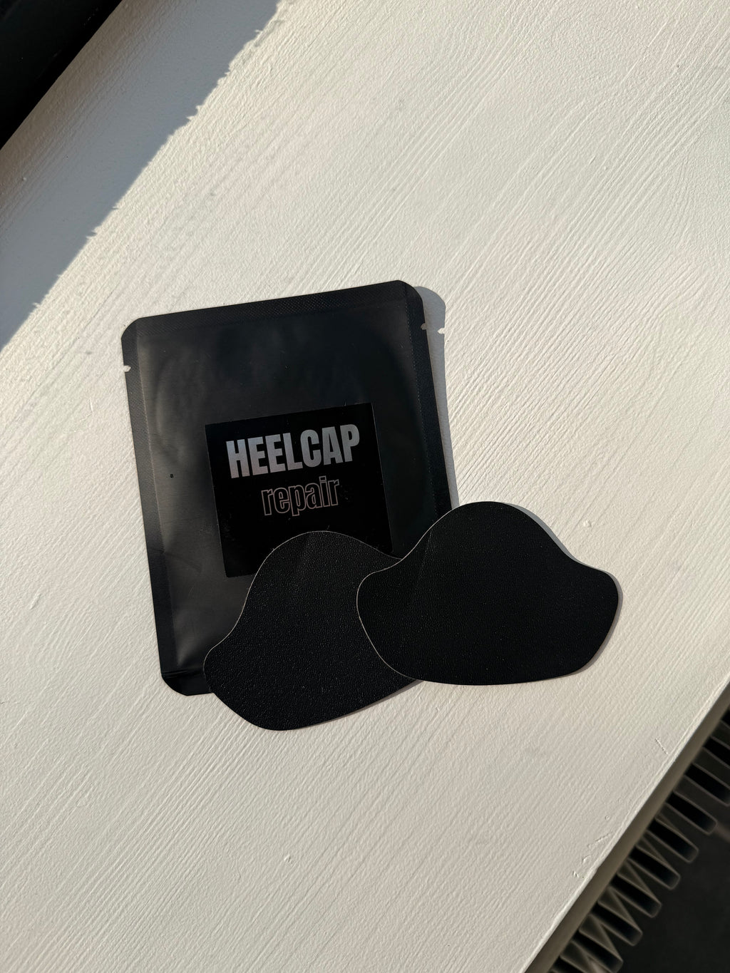 Kantapään paikka (Heelcap repair)